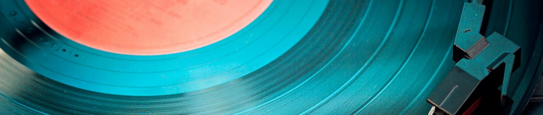 blue vinyl record playing on turntable